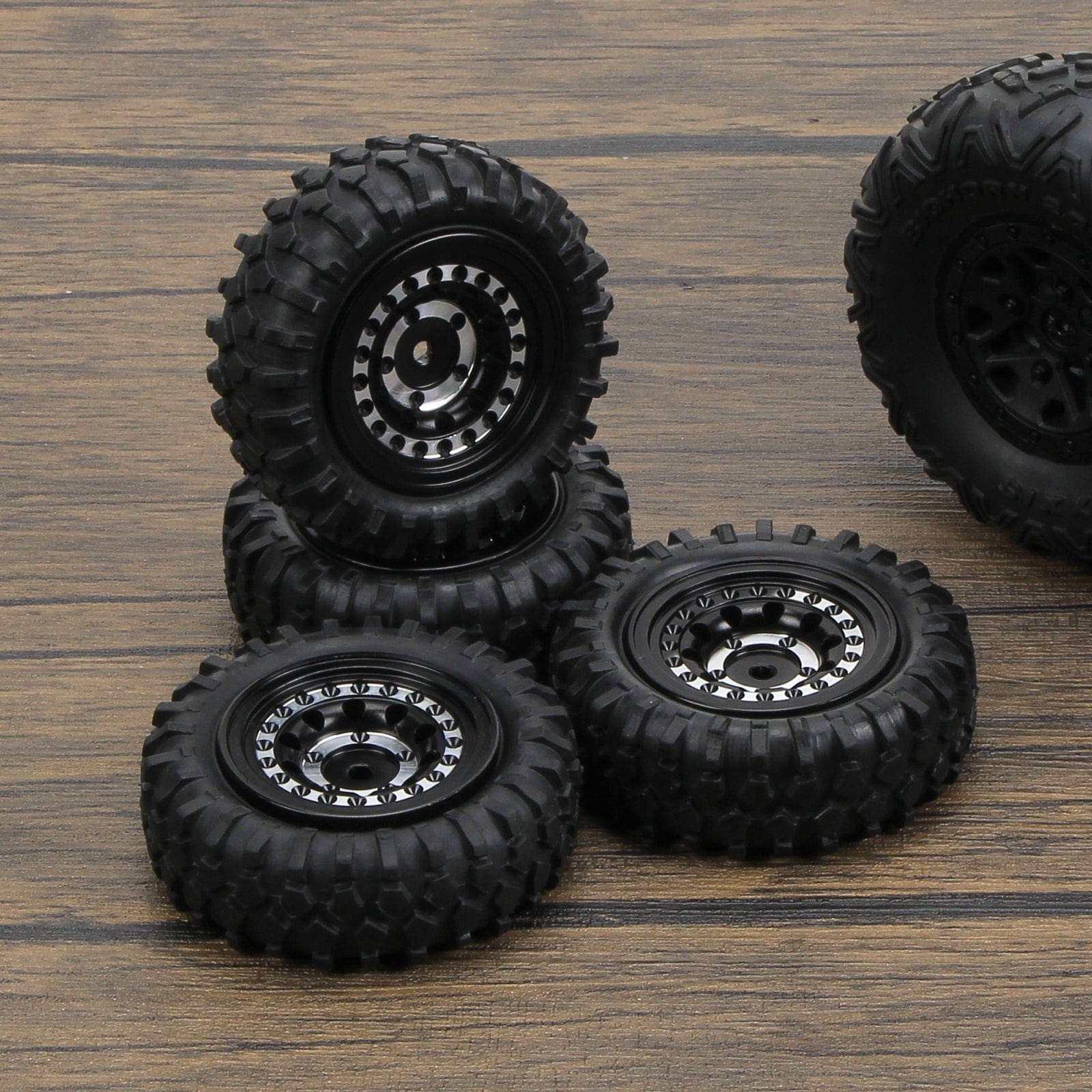 thumbnail interactive-video image 1 of RCAWD 1.3in Beadlock Wheel & Tire Set For FMS FCX24 & Axial SCX24 RC Crawlers - 4 Pre-Mounted 1 of 9